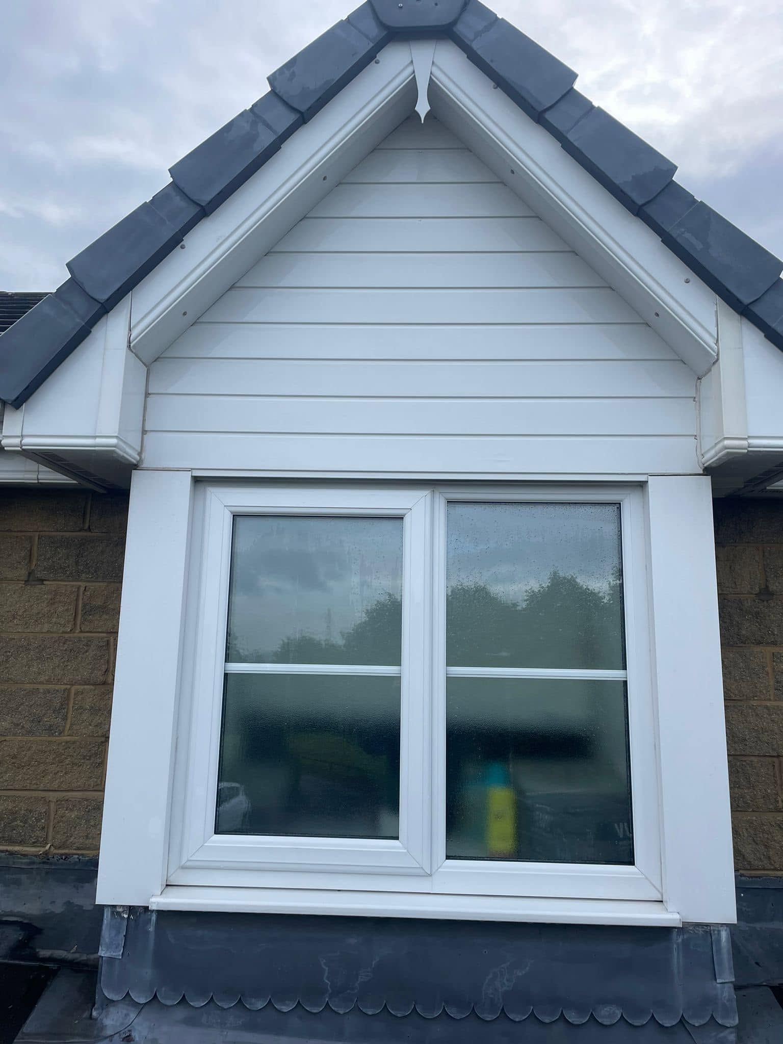JWF cleaning UPVC fascias and soffits back to white in Lancashire