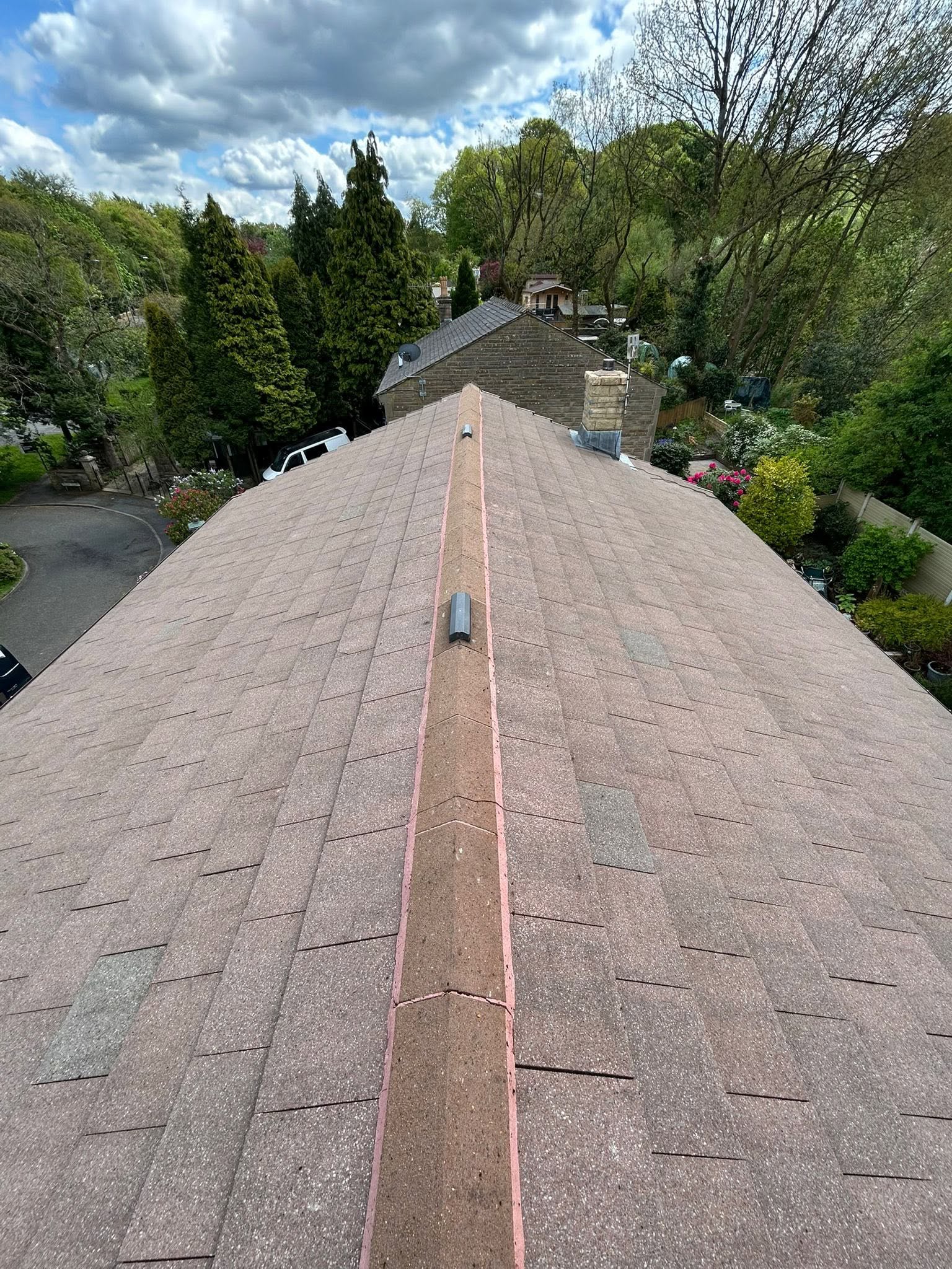 JWF soft washing and removing moss from a tiled roof in Lancashire