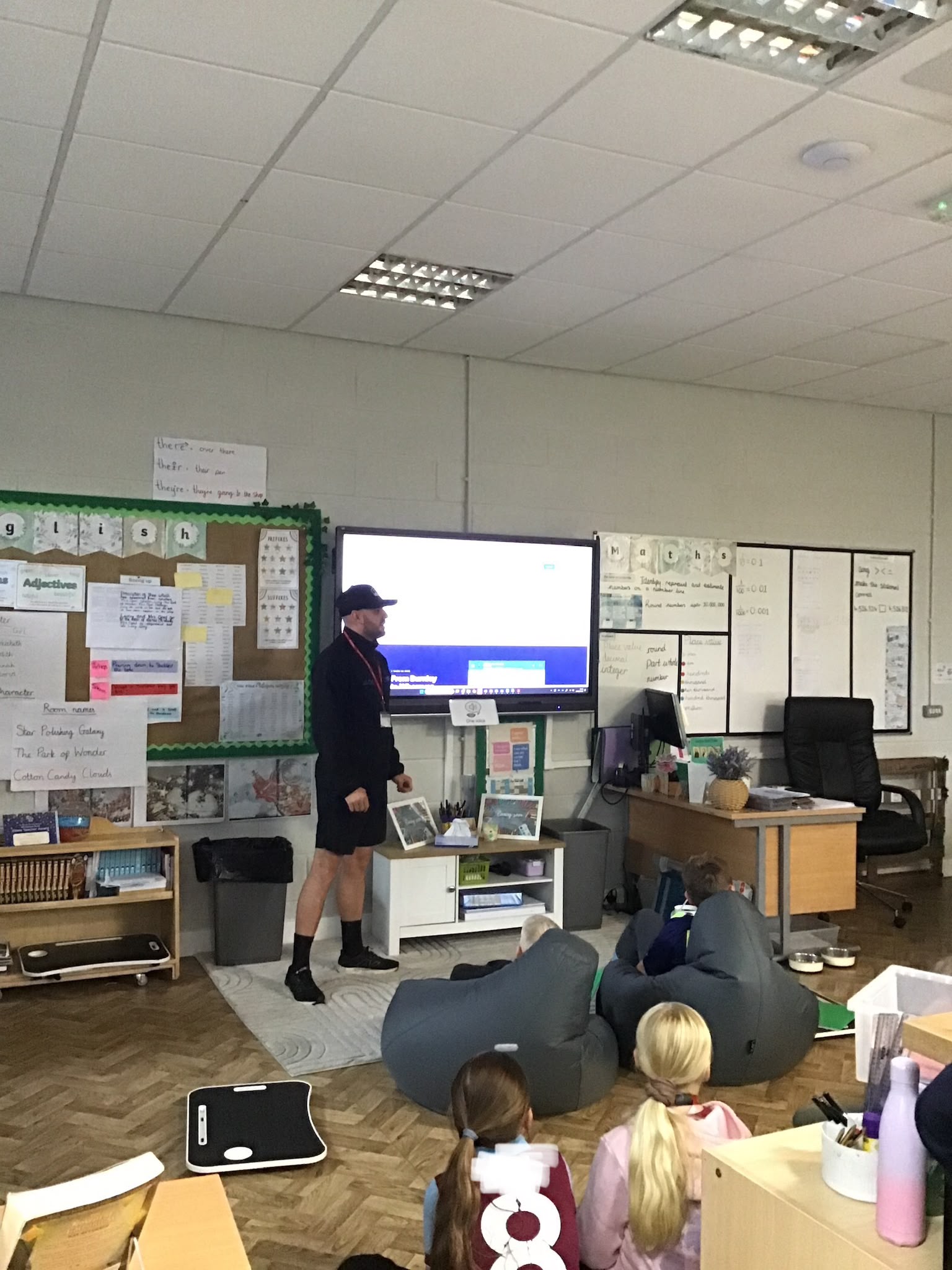 Jack Fairburn talking to the second class at Brunshaw Primary School about running a window cleaning business